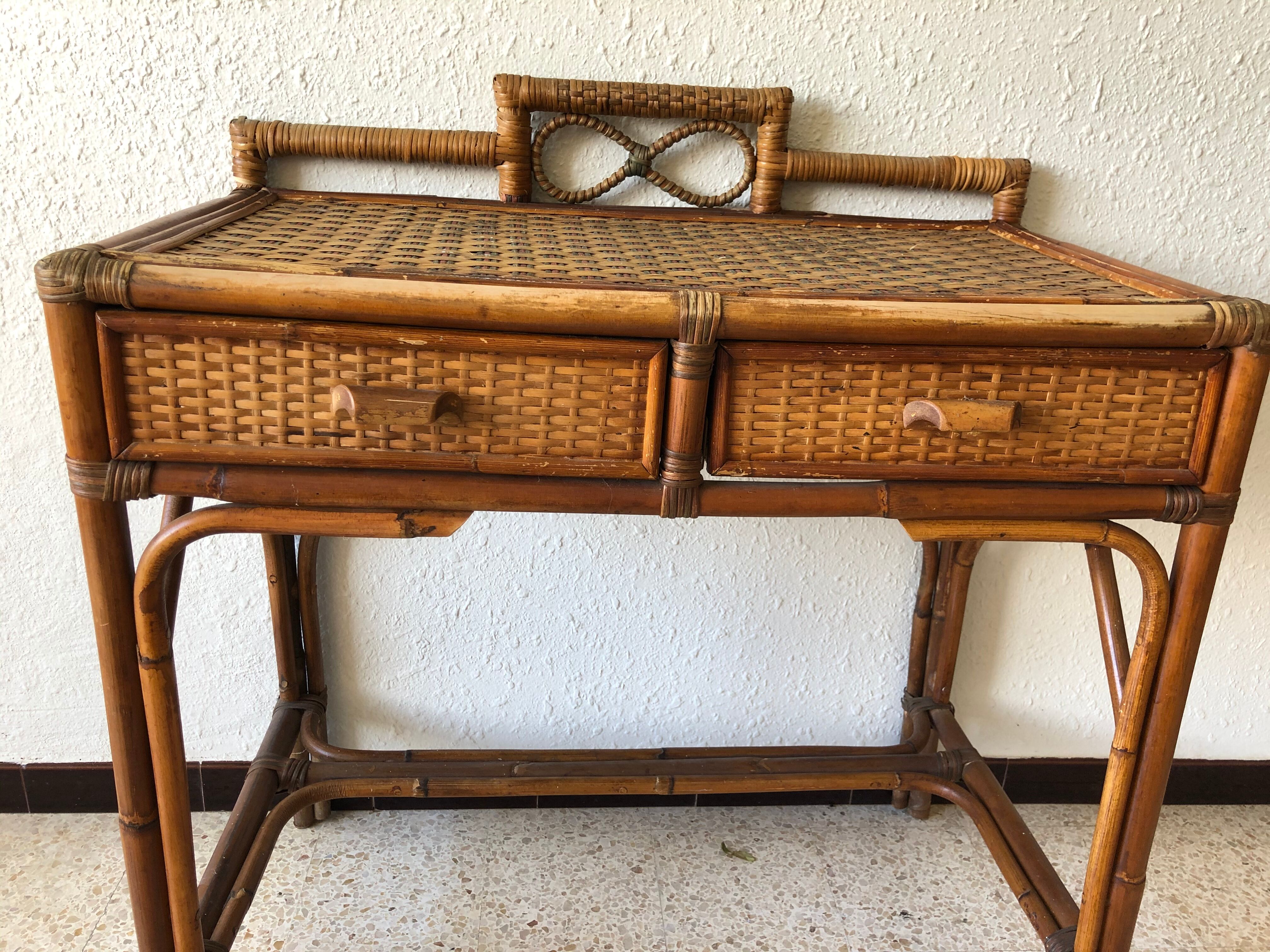 Console/small old desk in rattan