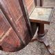 Old and large round winegrower's table made of wood.