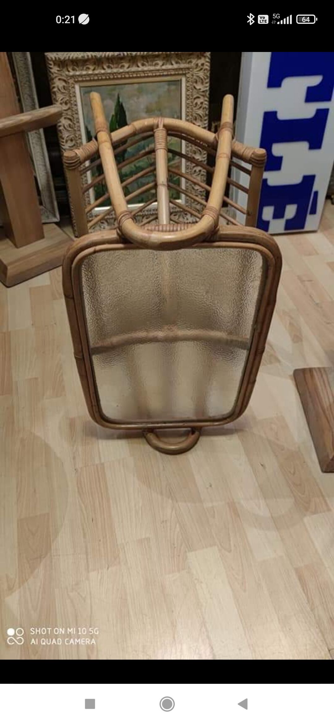 Rattan and frosted glass end table with magazine rack