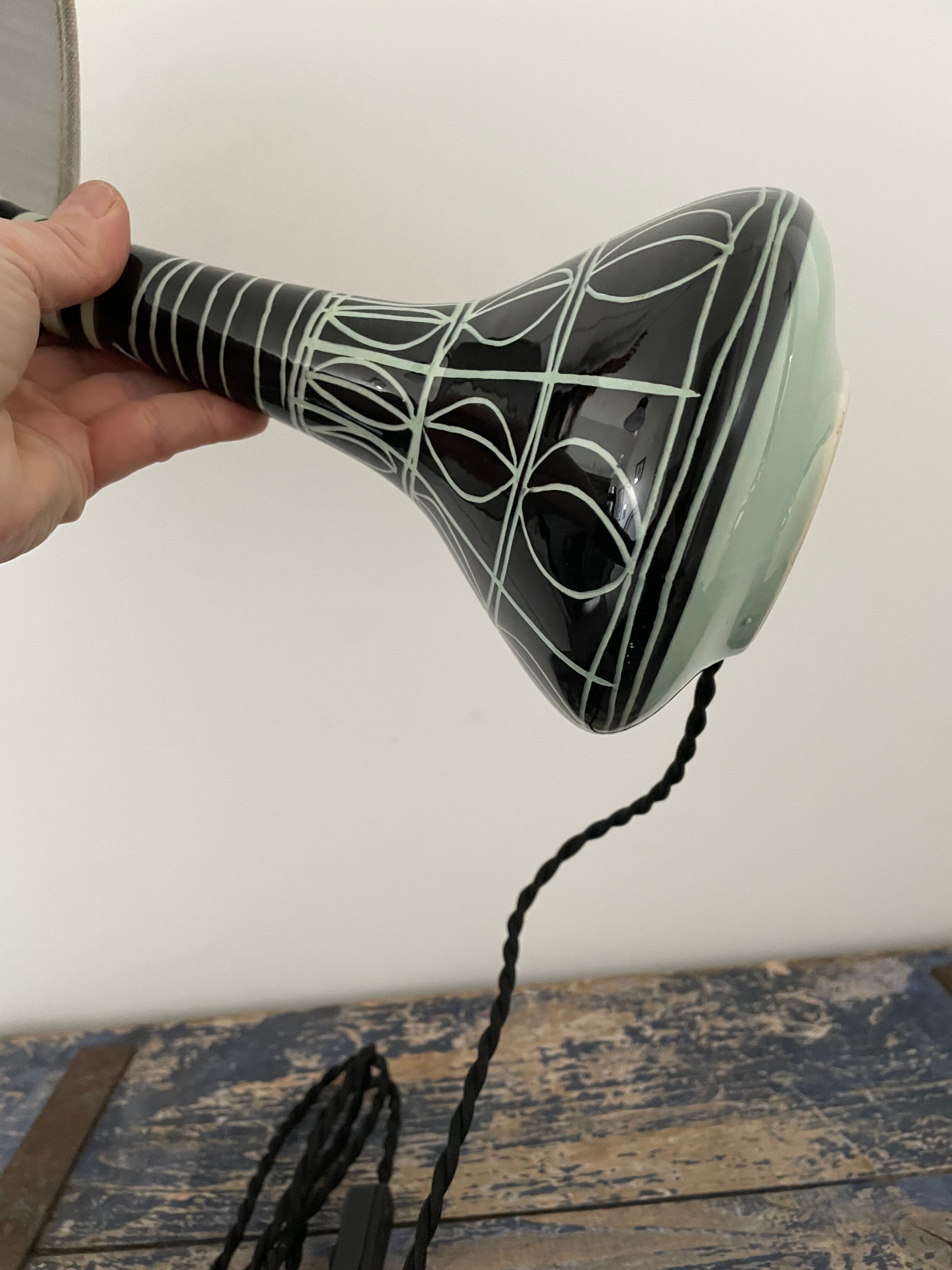 Vintage ceramic table lamp with electrified patterns to nine