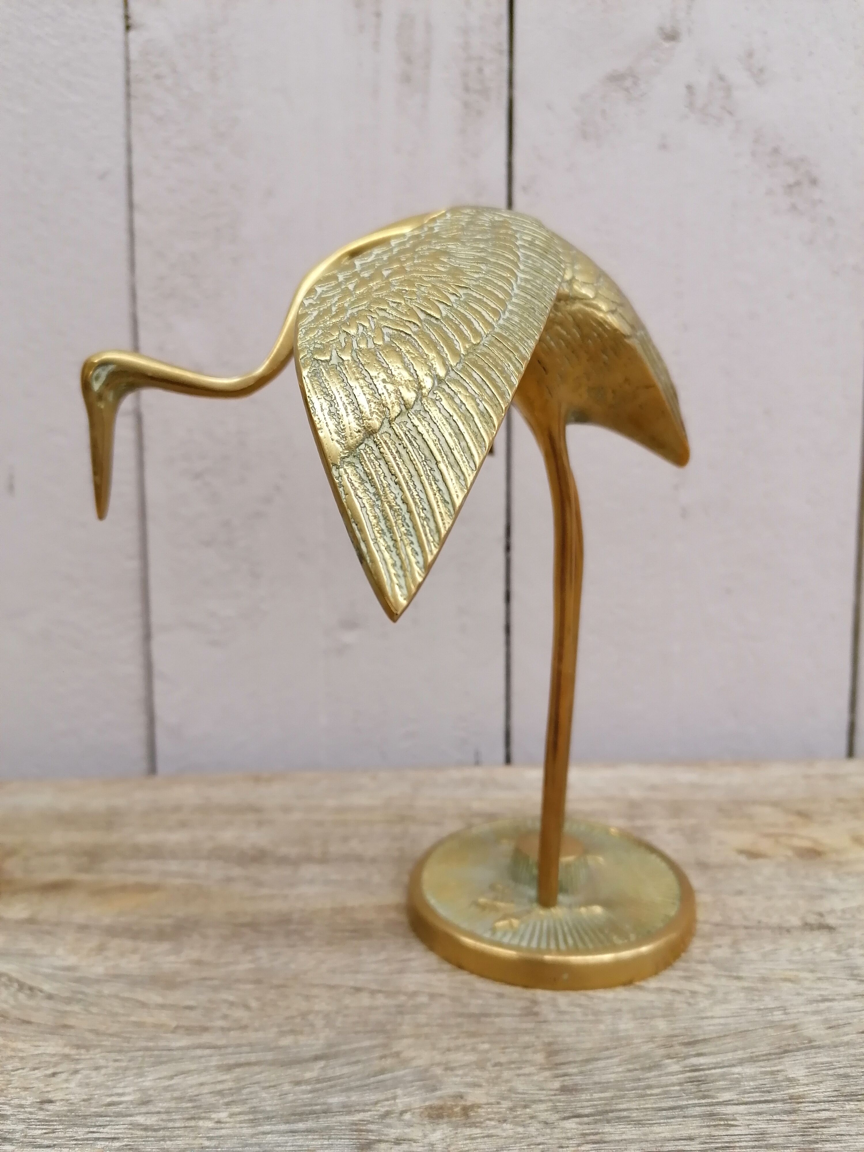 Pair of brass herons