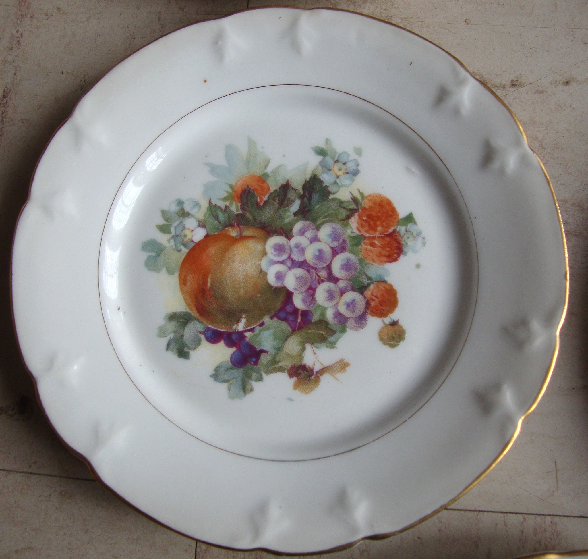 Set of 5 antique Limoges porcelain plates L.J.V with fruit decoration