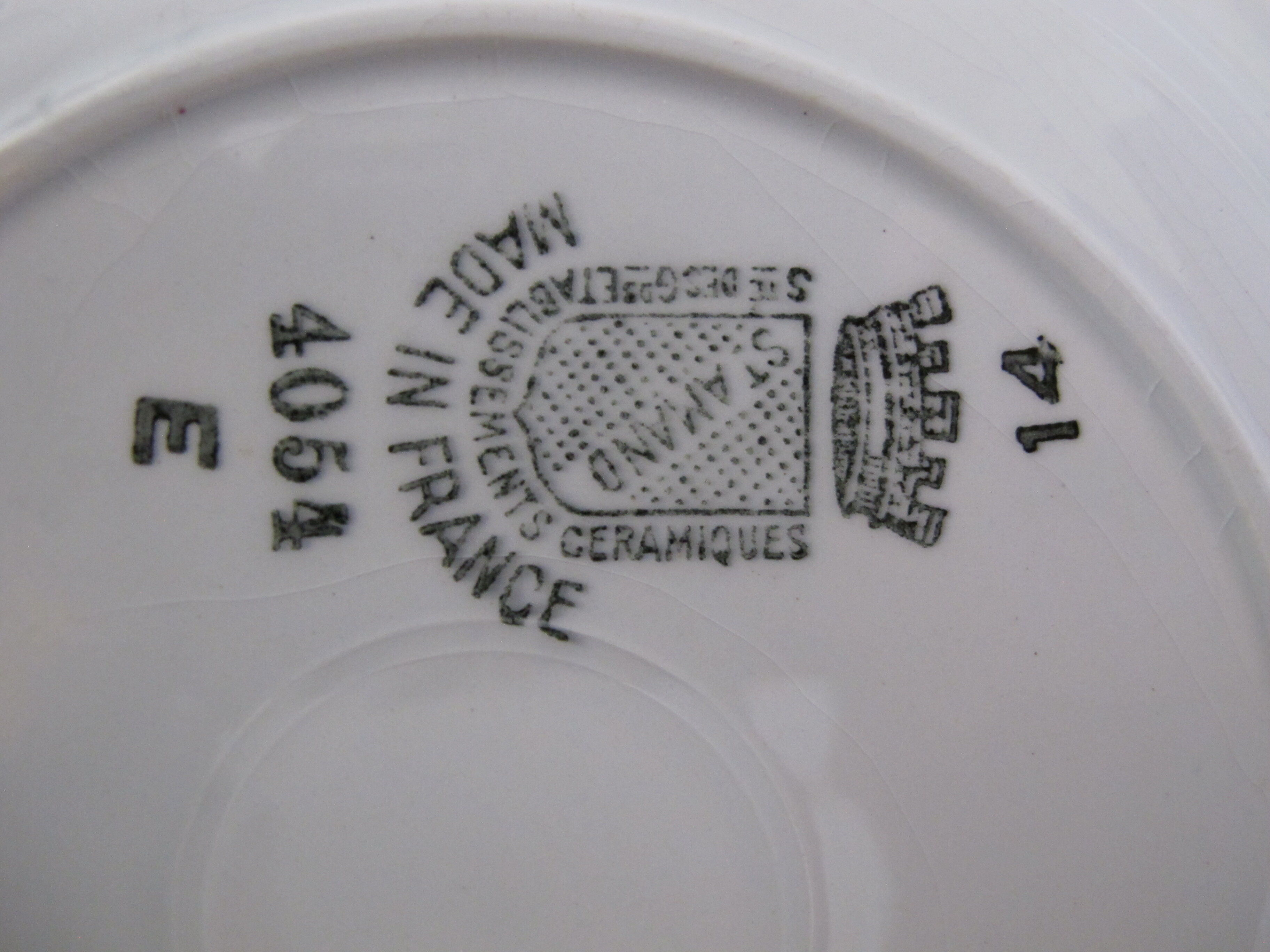 4 plates made of Saint Amand earthenware