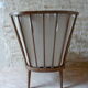 Fauteuil en bois dossier éventail baumann