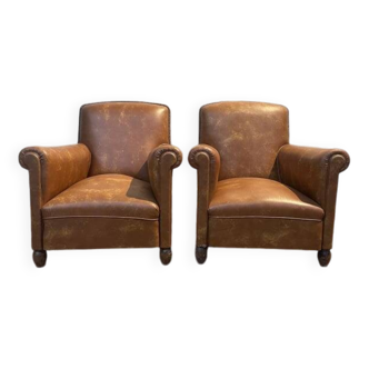 Paire de fauteuils Club en imitation cuir