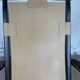 Colonial style leather armchair and ottoman
