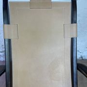 Colonial style leather armchair and ottoman