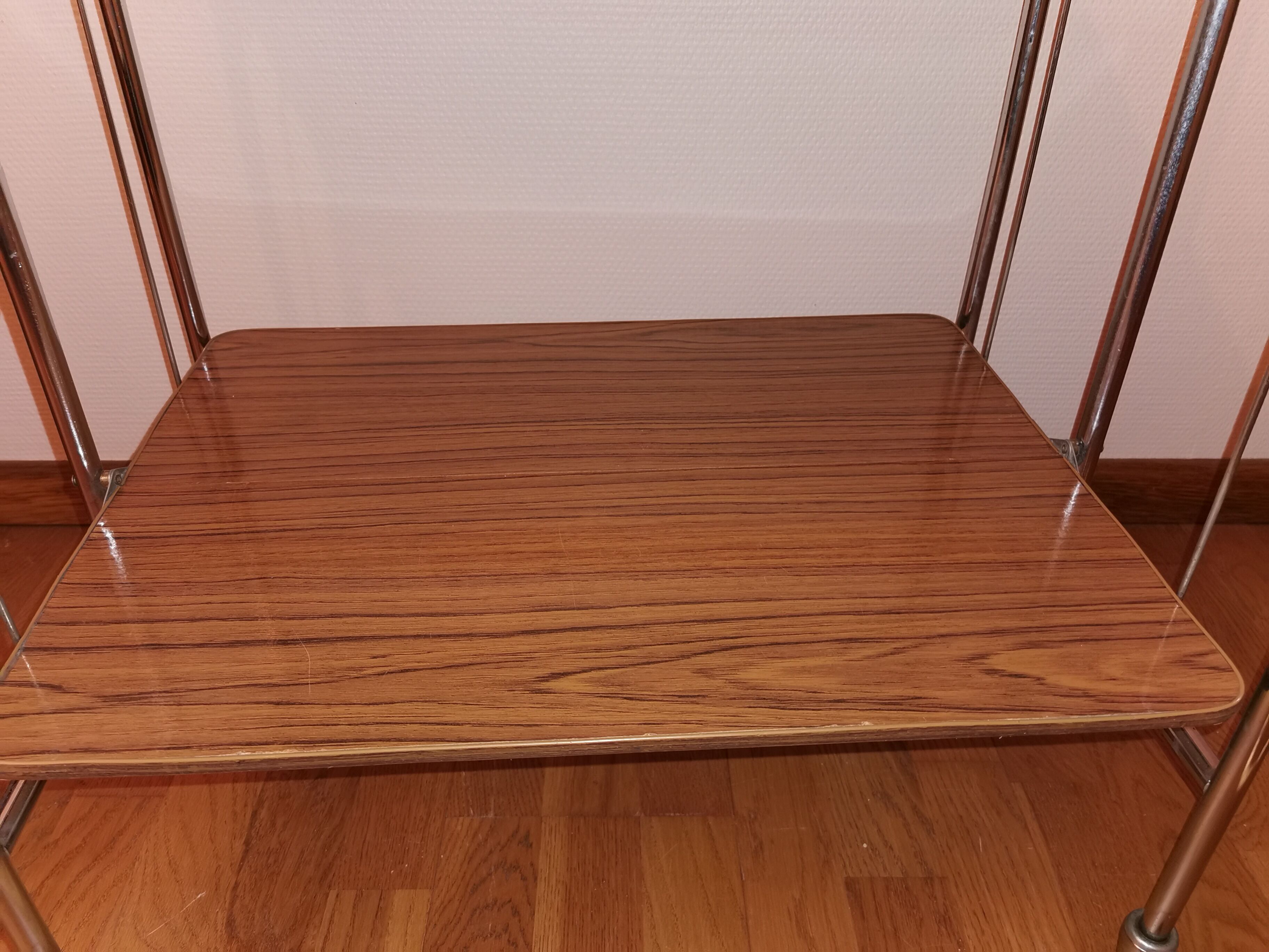 Vintage rolling and folding dessert trolley in chrome metal.