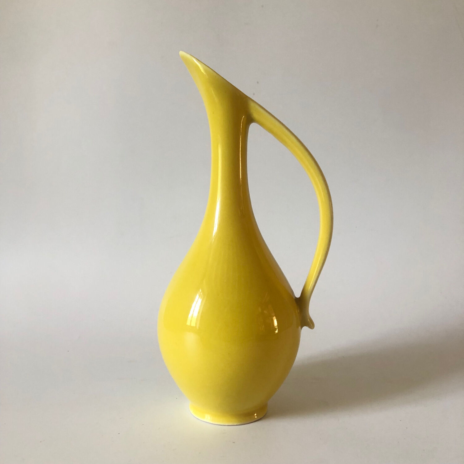 Vintage yellow ceramic decanter