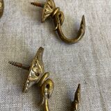 Old bronze coat hooks