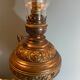 Nineteenth electrified brass kerosene lamp