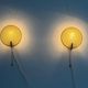 Pair of green plexiglass and gold metal wall lights by Erco, 1950s, Germany.