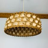 Suspension rattan and palm leaves chic jungle style