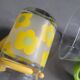 Pair of glass teacups with plastic handles