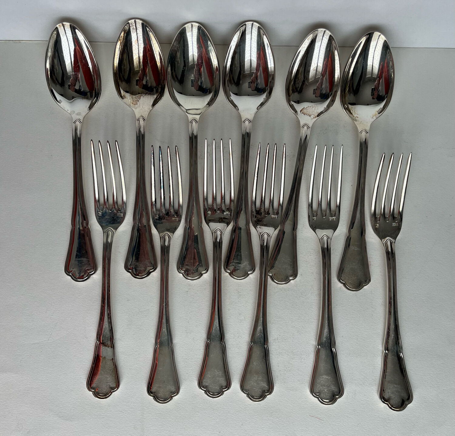 12 Ercuis silver-plated cutlery sets