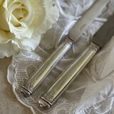 12 antique Christofle knives.