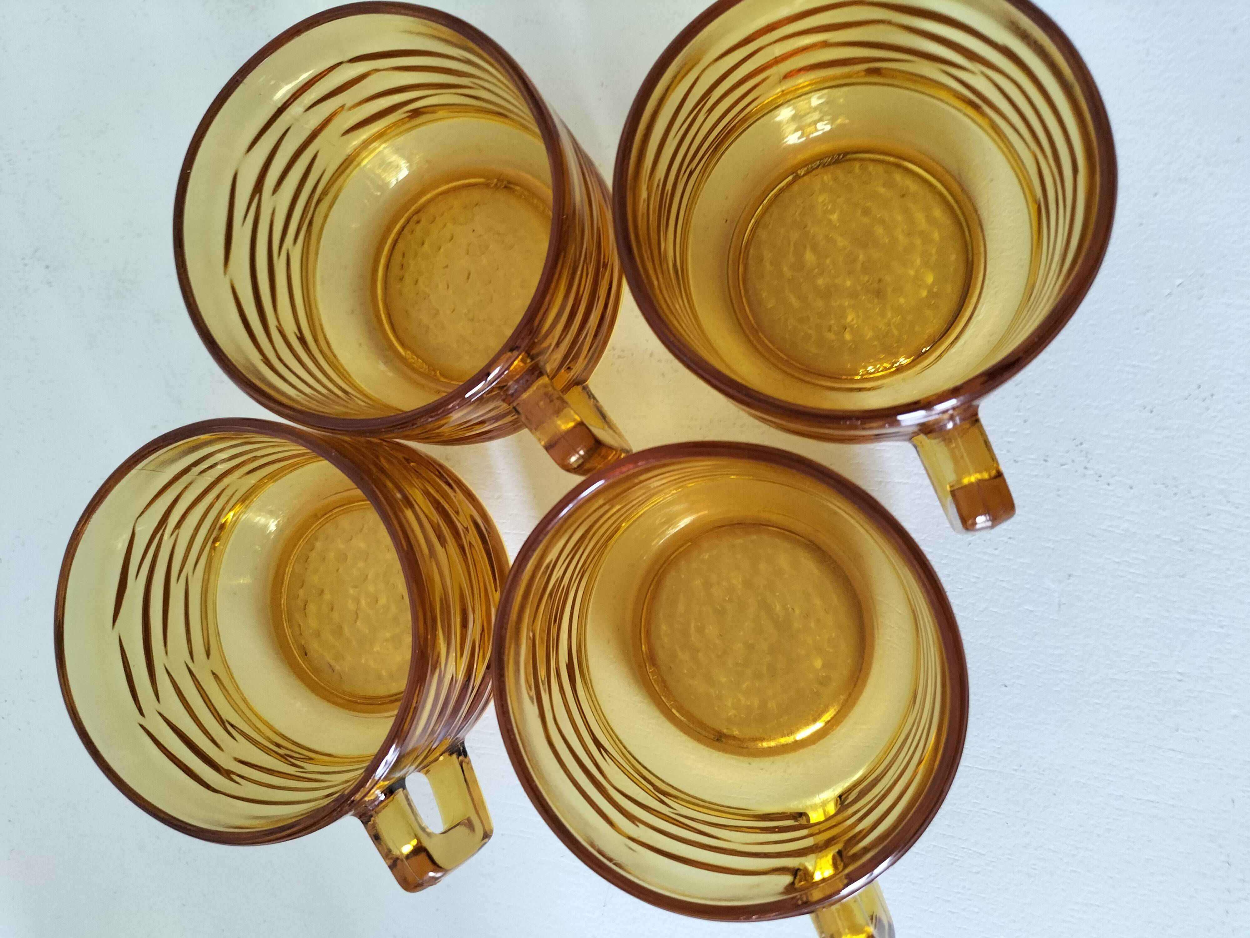 Set of 4 vintage amber glass mugs with textured 70s design