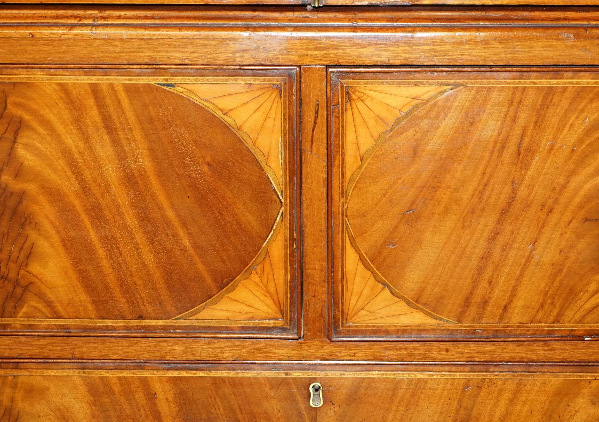 George III Sheraton linen cupboard in walnut, circa 1760.