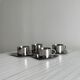 set of 4 stackable stainless steel coffee cups with saucers