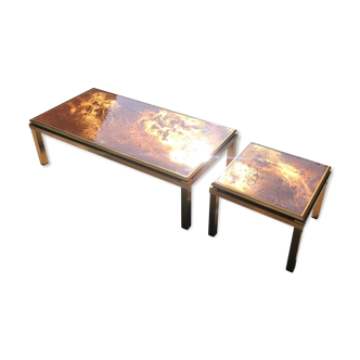 Brass coffee tables and enamelled glass, 70
