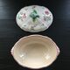 Vegetable dish with floral decoration