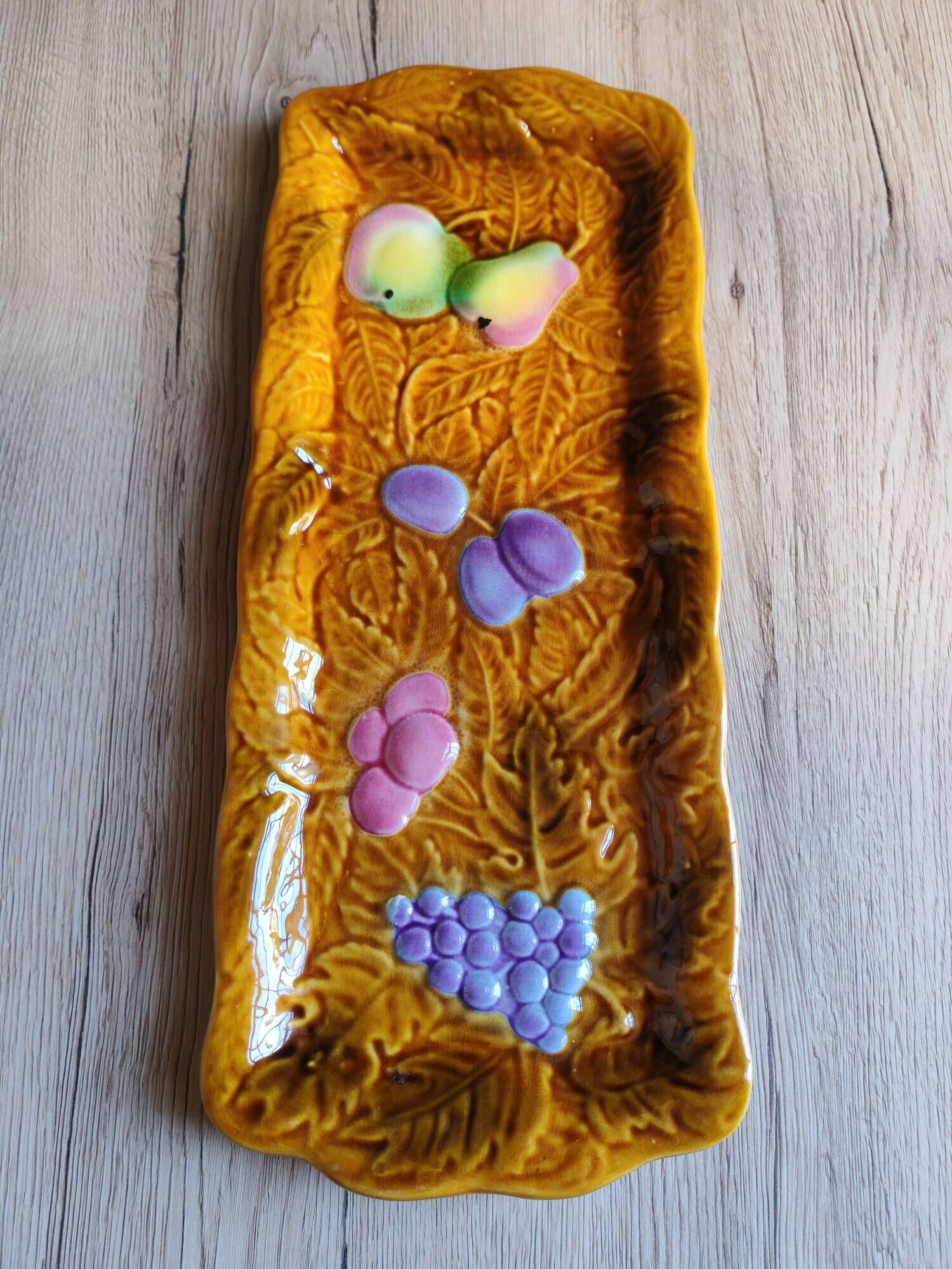 Vintage barbotine pocket dish from Salins les Bains, relief decoration of fruits.