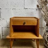 Bedside table with compass feet