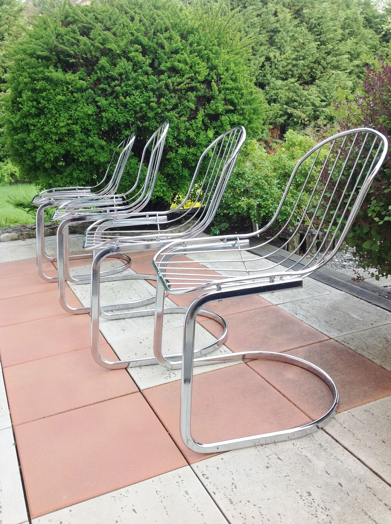 Set of four chrome metal wired chairs by Gastone Rinaldi / vintage 70s