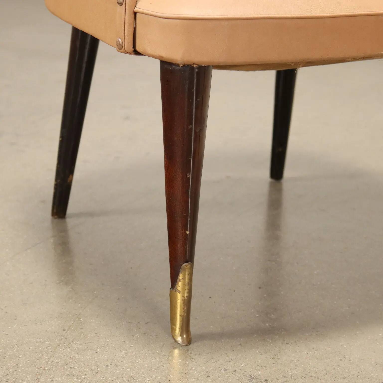 Pair of vintage armchairs from the 50s-60s in ebony wood, brass, with padded seats.