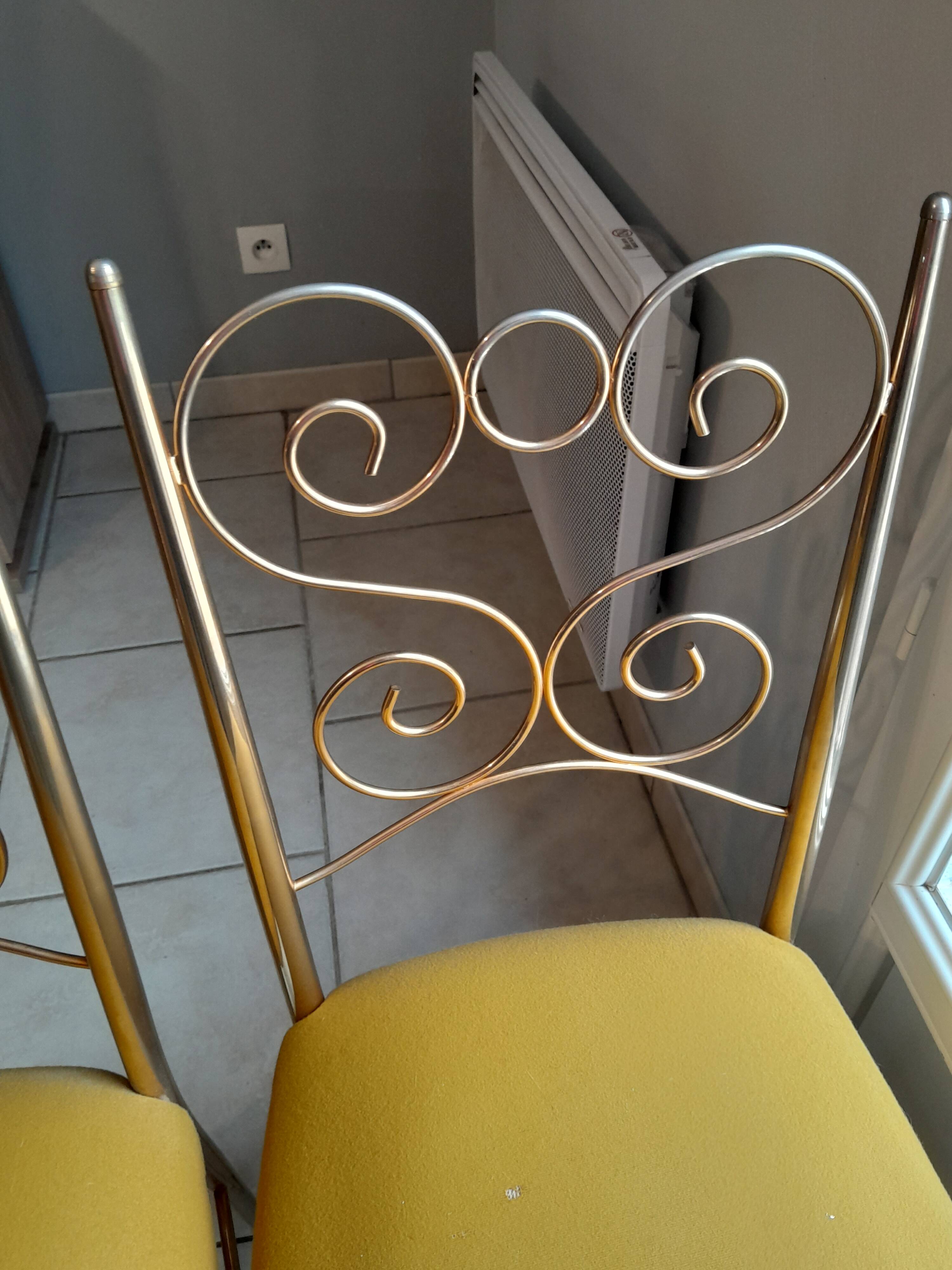 Pair of vintage golden designer chairs from the 50s