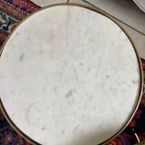 Pull-out table in marble and brass