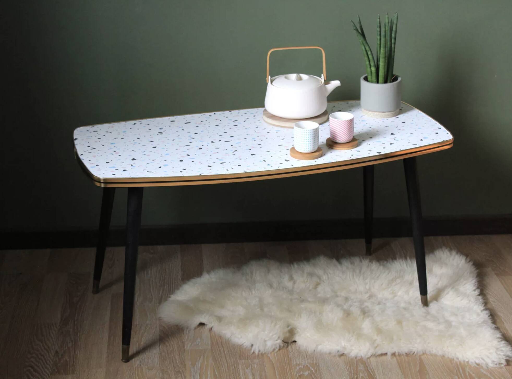 Formica/Terrazzo coffee table with brass compass legs
