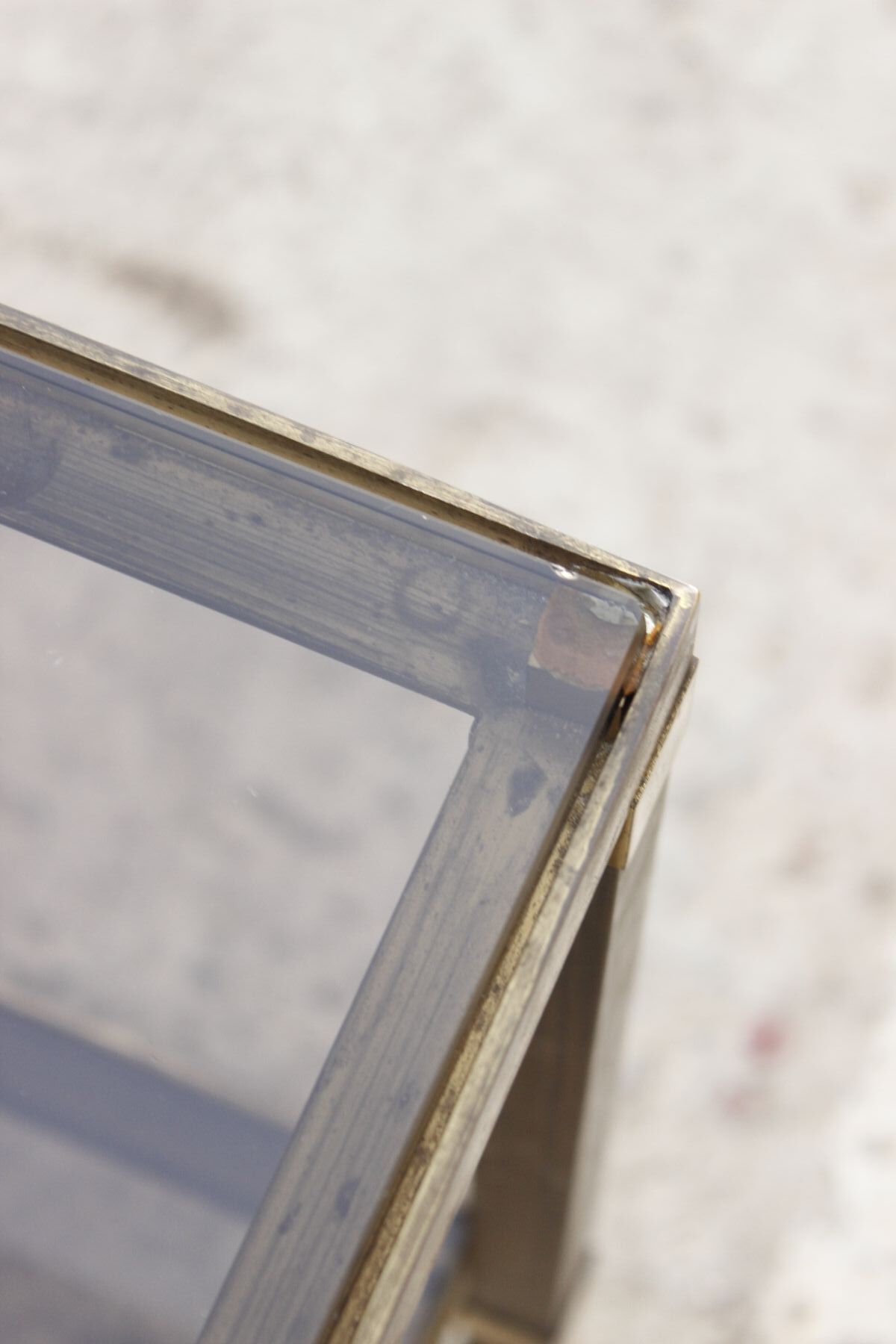 Table coffee in brass, bronze and smoked glass, France, 1950