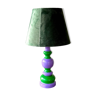 Le lampe en bois boule violet et verte.