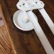 Vintage white metal coat rack with 2 hooks