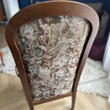 Upholstered armchair with floral pattern – Carved wooden structure – Vintage