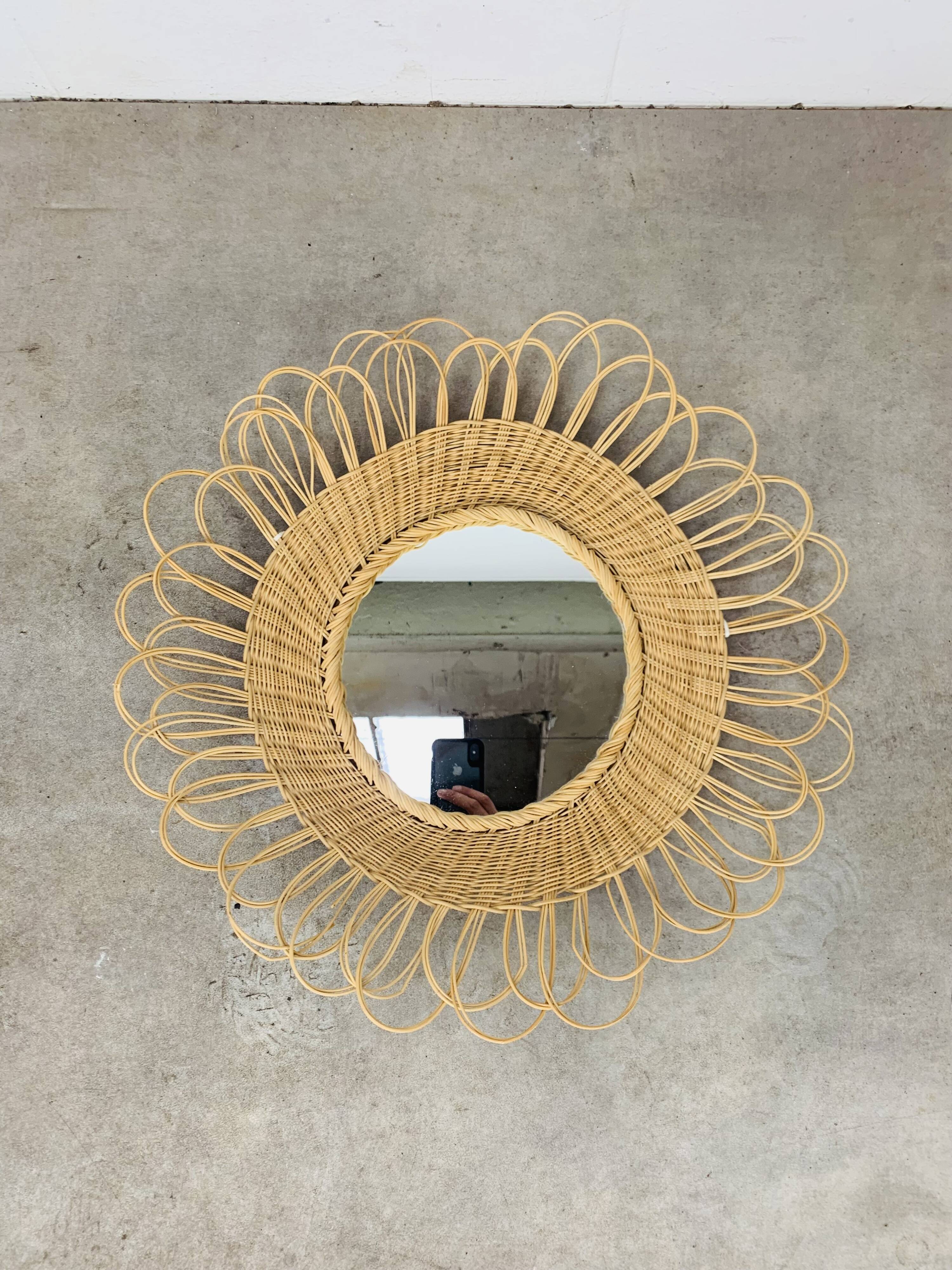 Vintage rattan sun mirror from the 60s