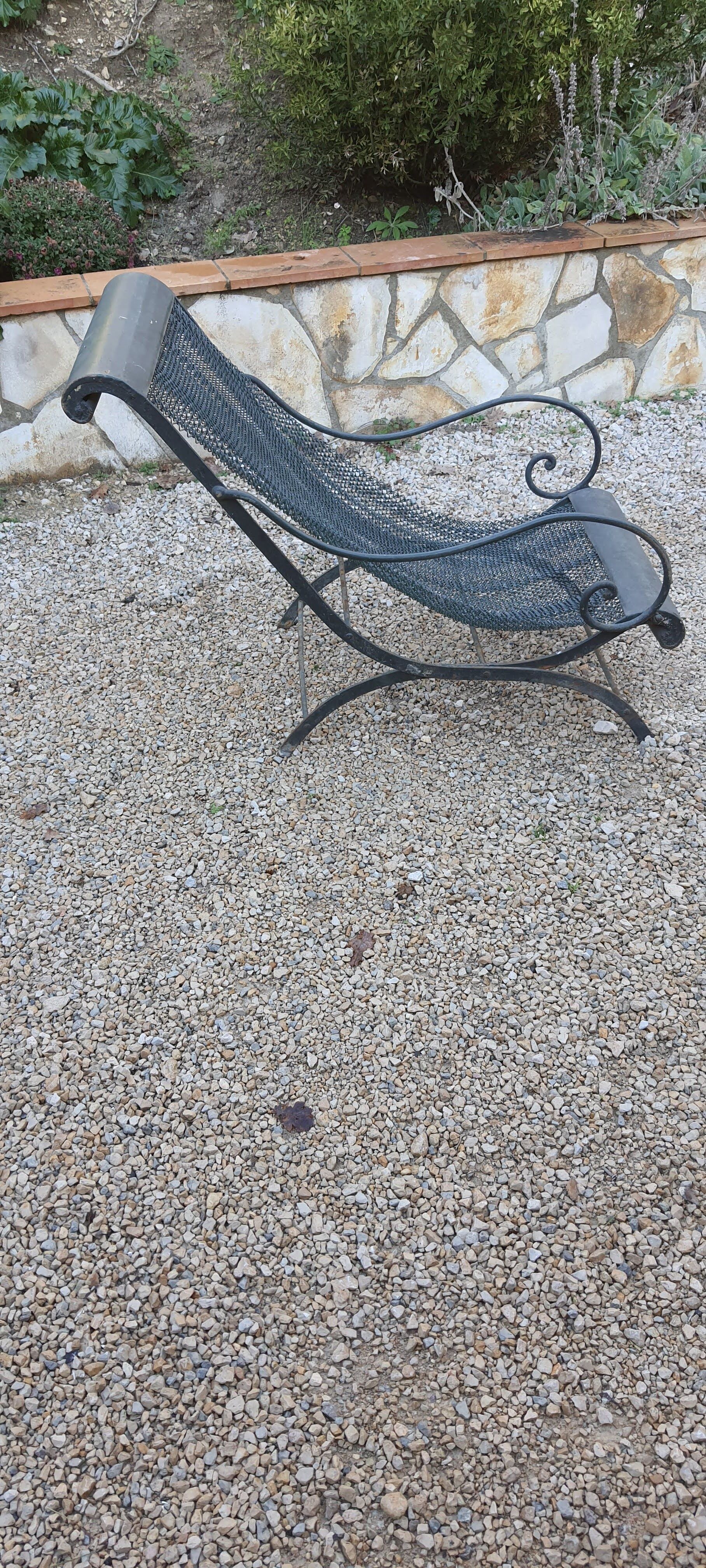 Relaxed wrought iron chair