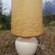 Vintage ceramic table lamp and golden lampshade.