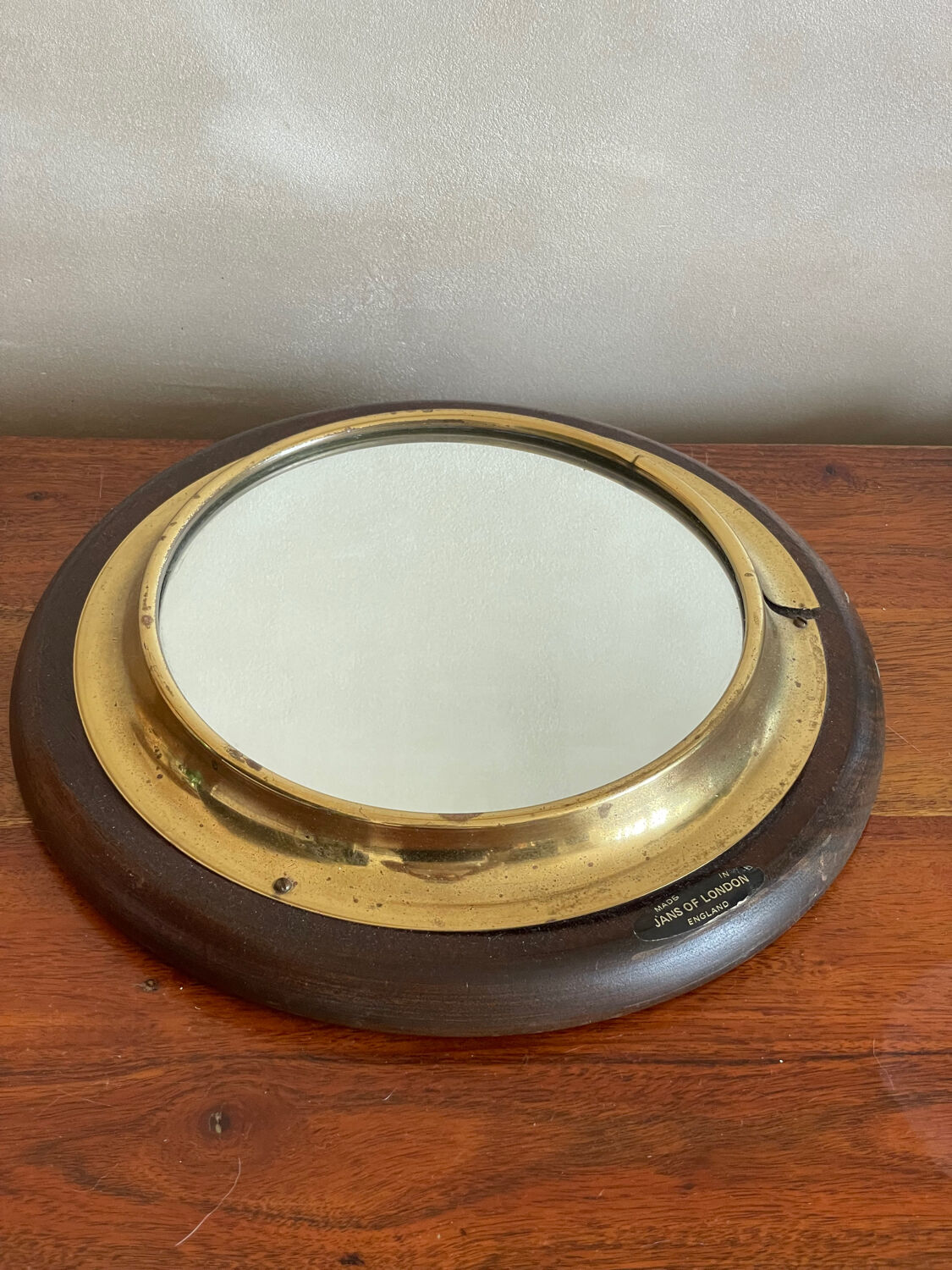 Wood and brass mirror