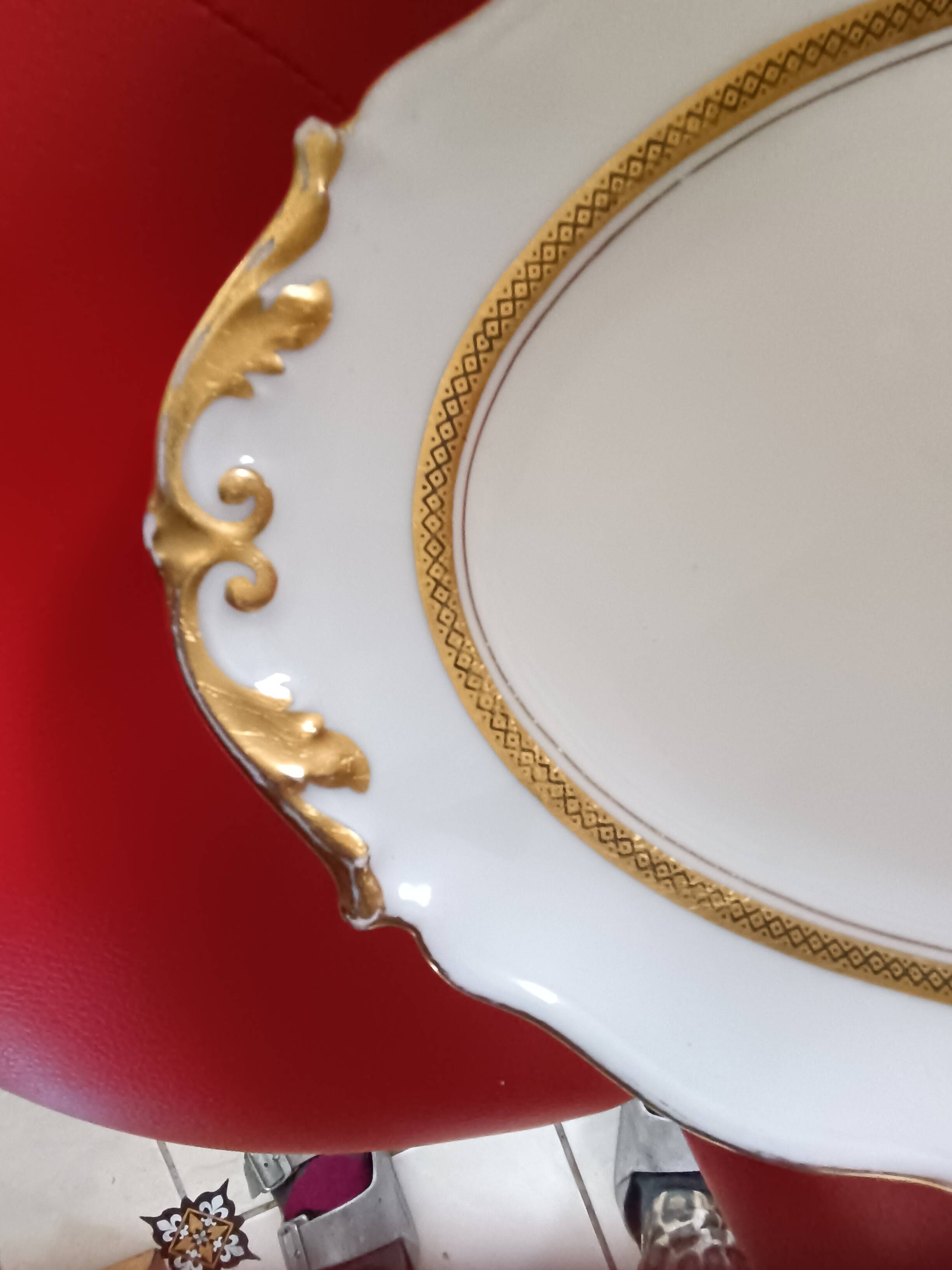 Oval dish. Limoges Montambert art porcelain. White matt gold rim;