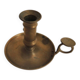 Old hand-push brass candlestick