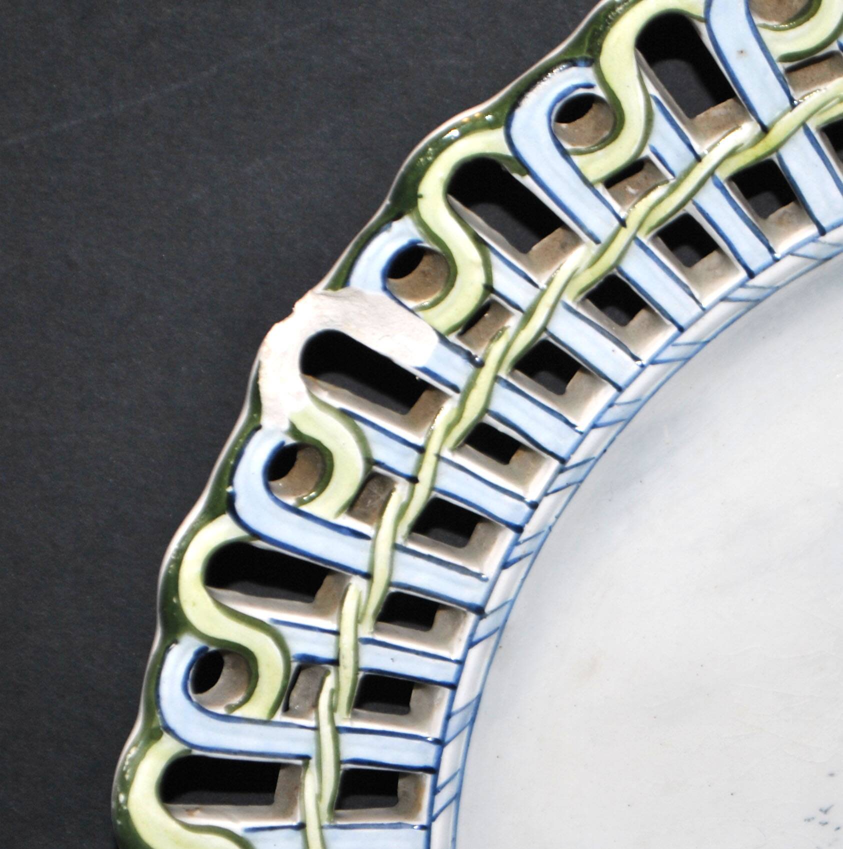 Painted collector's plate with openwork edge epinal by henri schmitt 1900