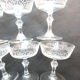 6 Louis XV style champagne glasses engraved with arabesques, baluster foot