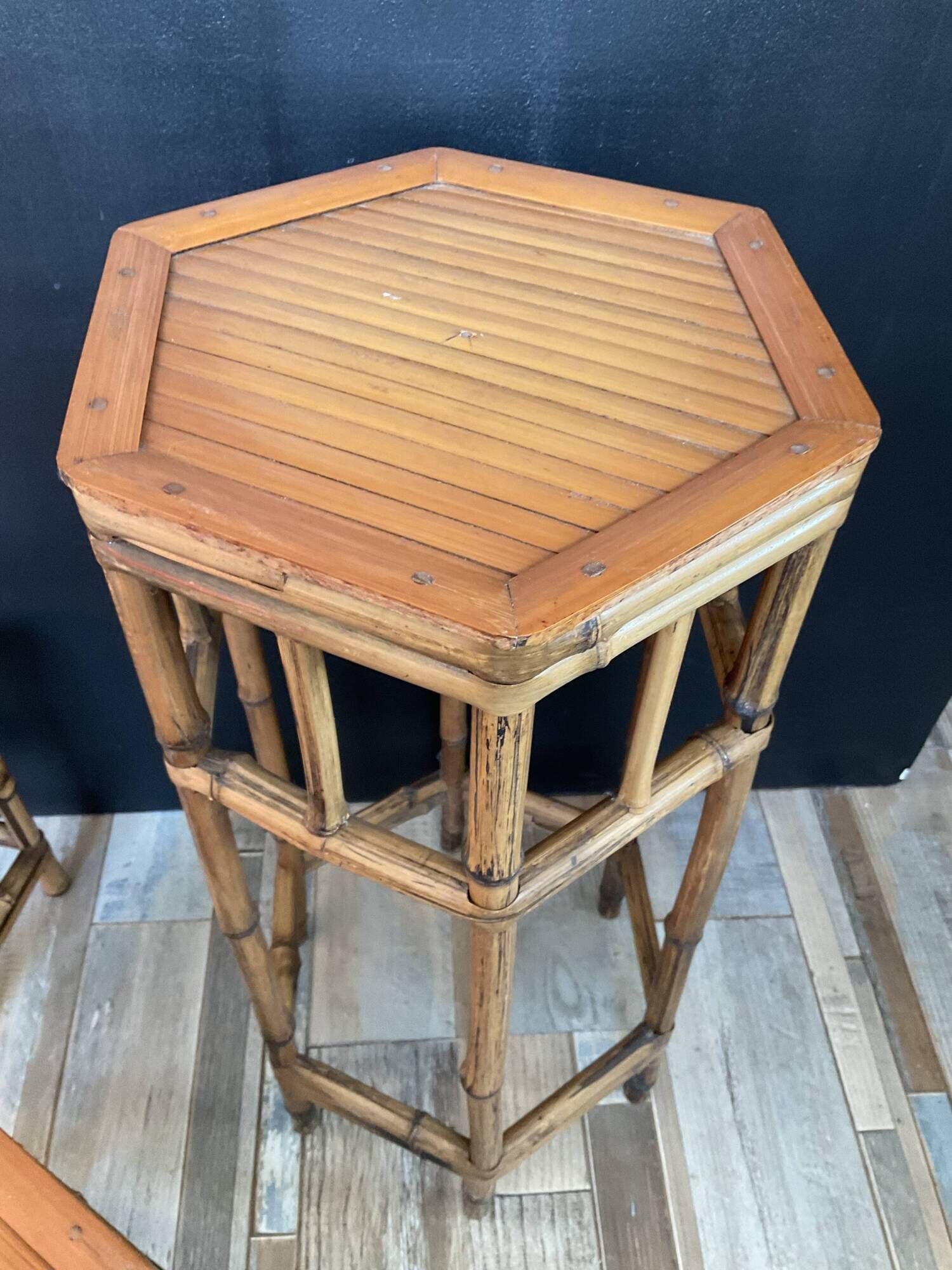 Trio of vintage rattan plant holders in the 60s