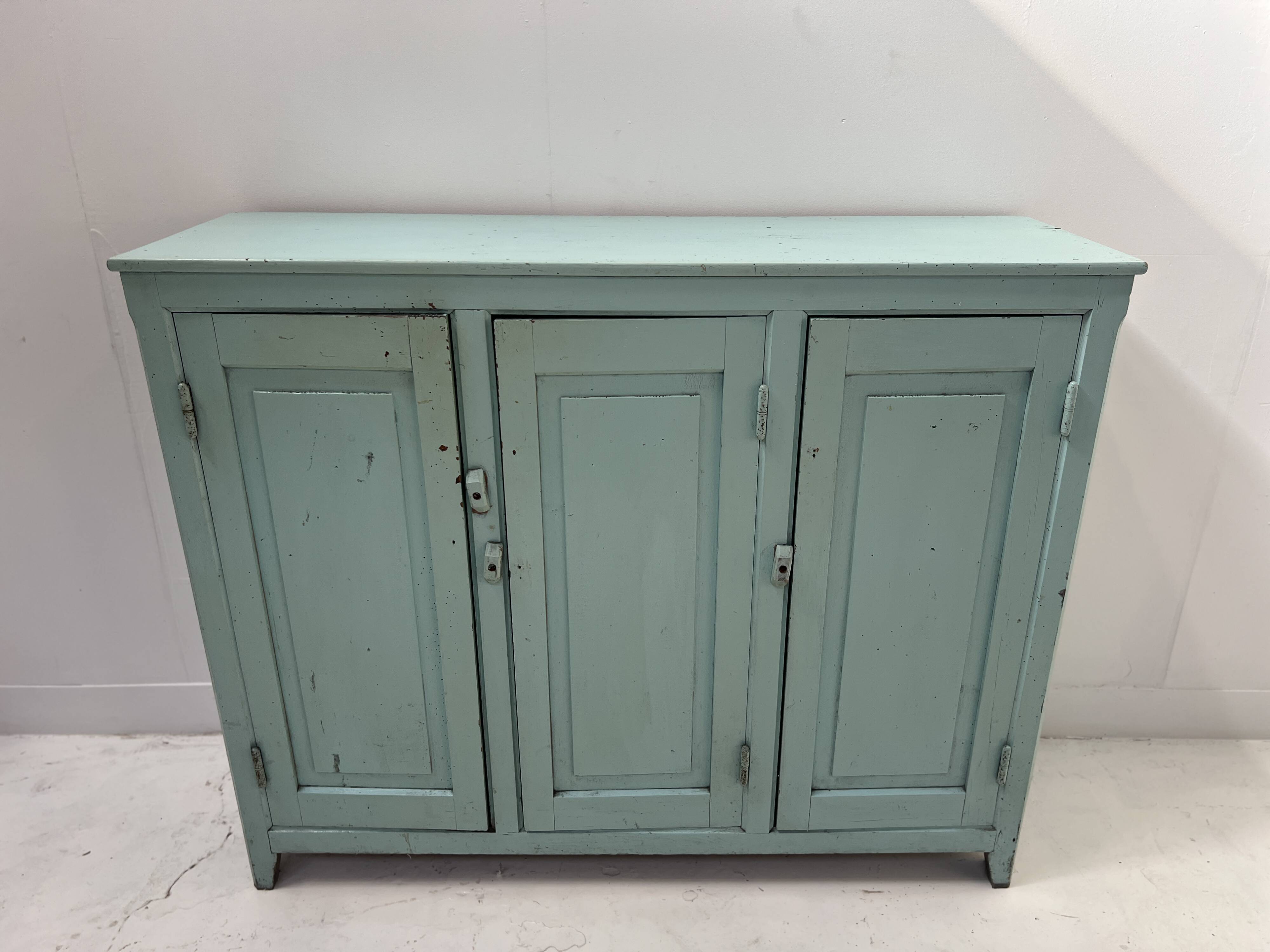 Parisian buffet with three doors in patinated beech, 20th century.