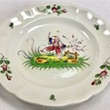 Hollow round dish décor with Chinese Saint Clément Lunéville