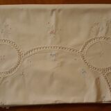 White tablecloth embroidered with lace & days