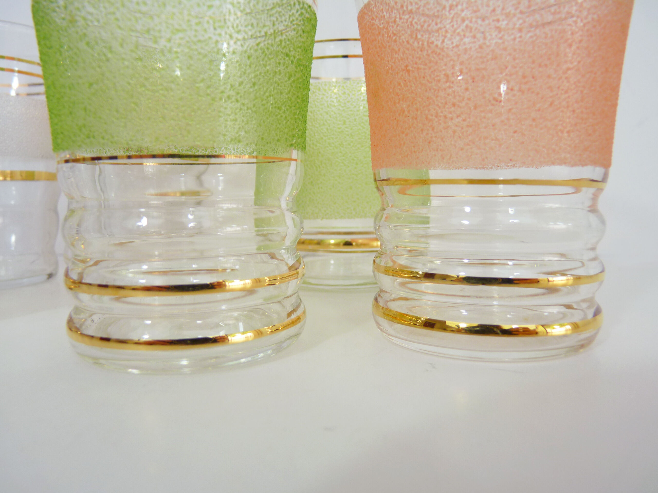 6 old glasses in coloured granite glass and gold lise