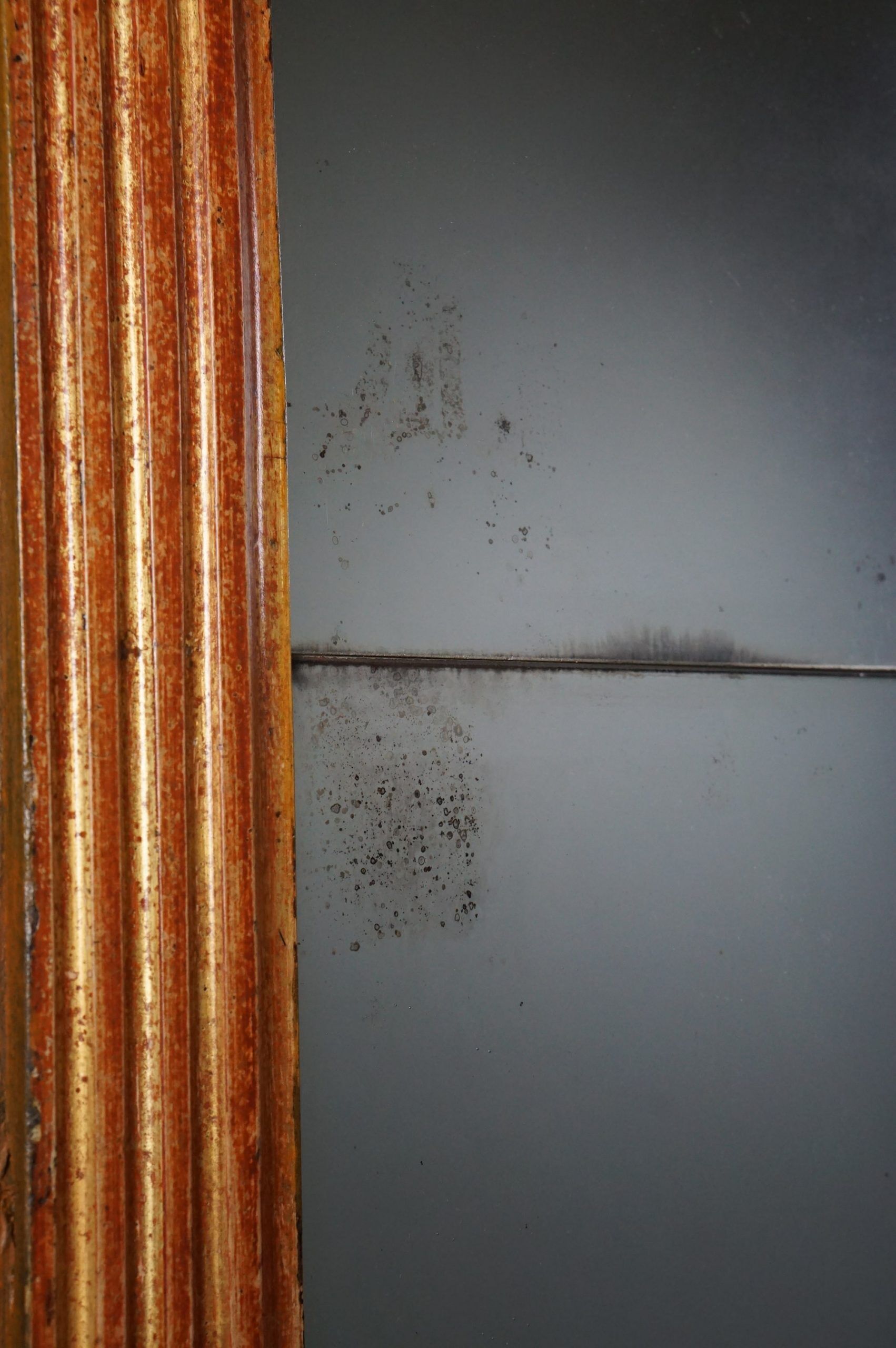 Patinated golden fireplace mirror eighteenth century 123 x 91.5 cm